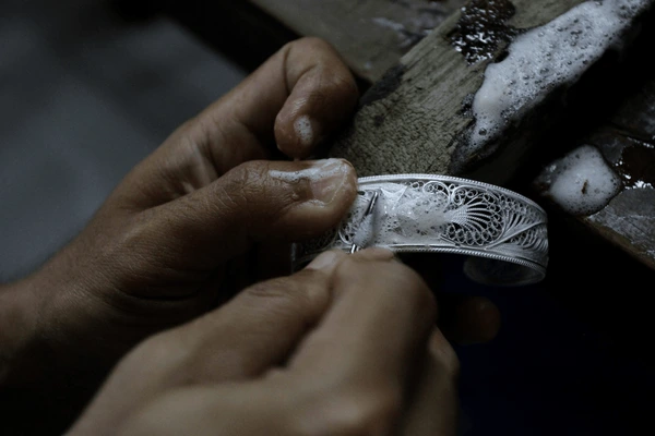 The hand. The hammer. The hour.