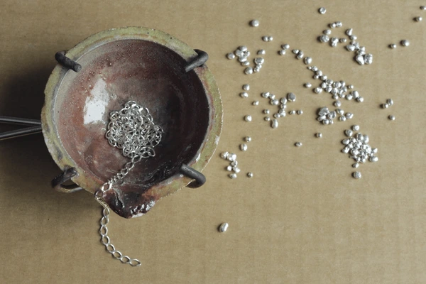 Each piece, shaped one at a time.
